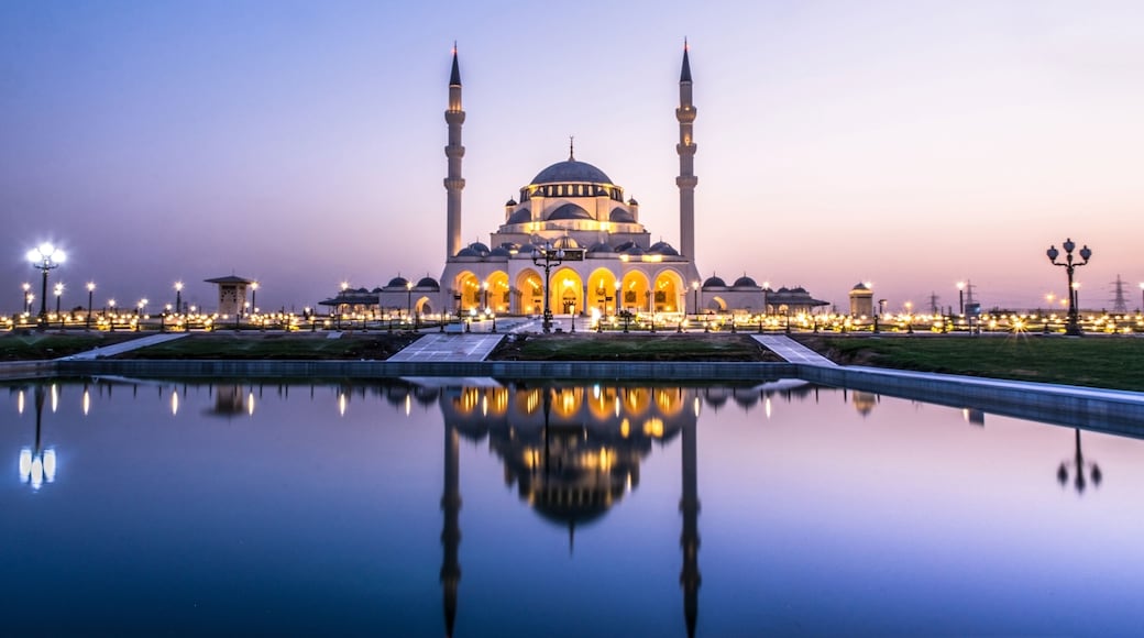 Beautiful Mosque in the world Largest Mosque in Sharjah traditional Islamic architecture new tourist attraction in Middle East evening shot of New Sharjah Mosque