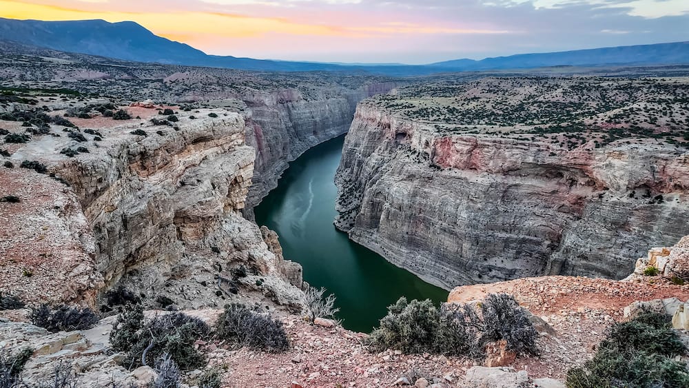 A canyon with a river running through it.