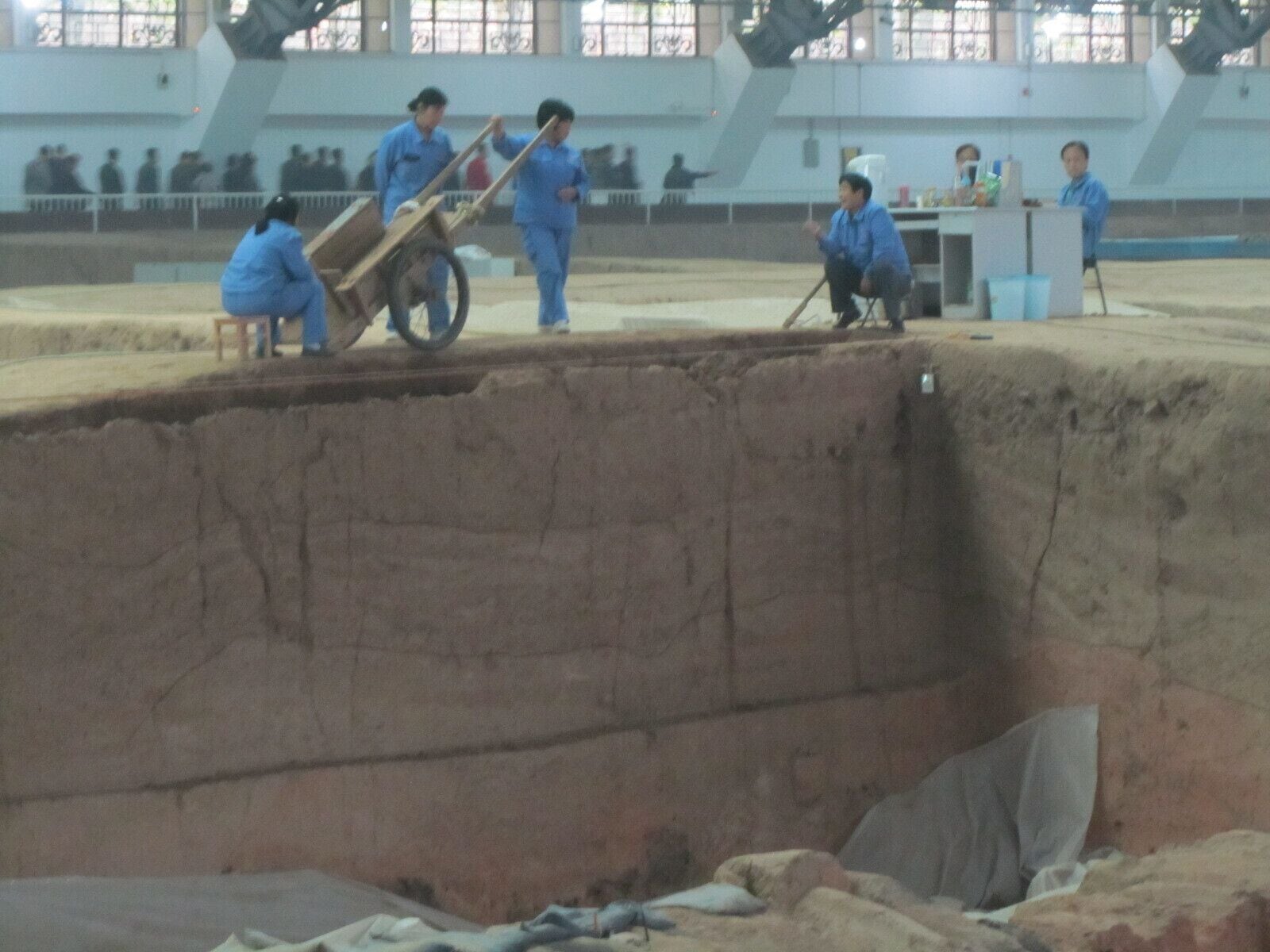 What are they doing today? Why is there a desk set up? The excavation of the terracotta warriors is a long and arduous project. To me, the scale of the restorations was the true jaw-dropping part of my trip out to the see the warriors. #antiquity #China