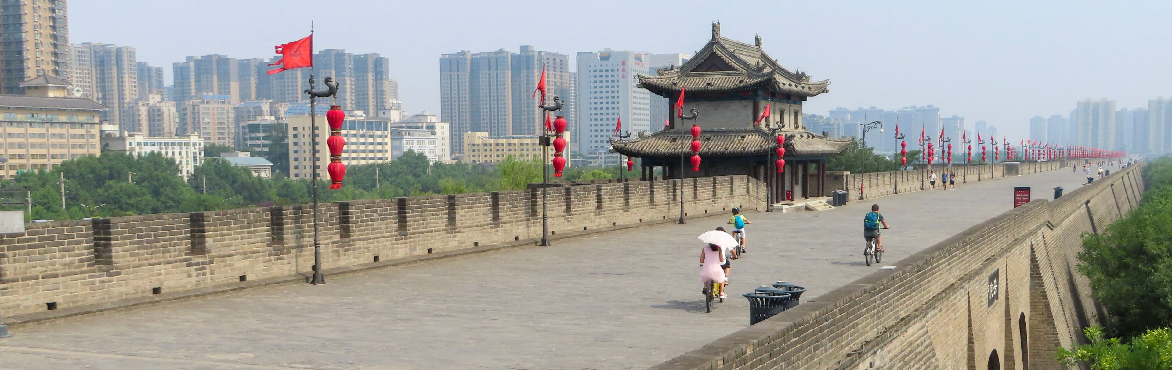 Xian City Wall in China with people walking on top.