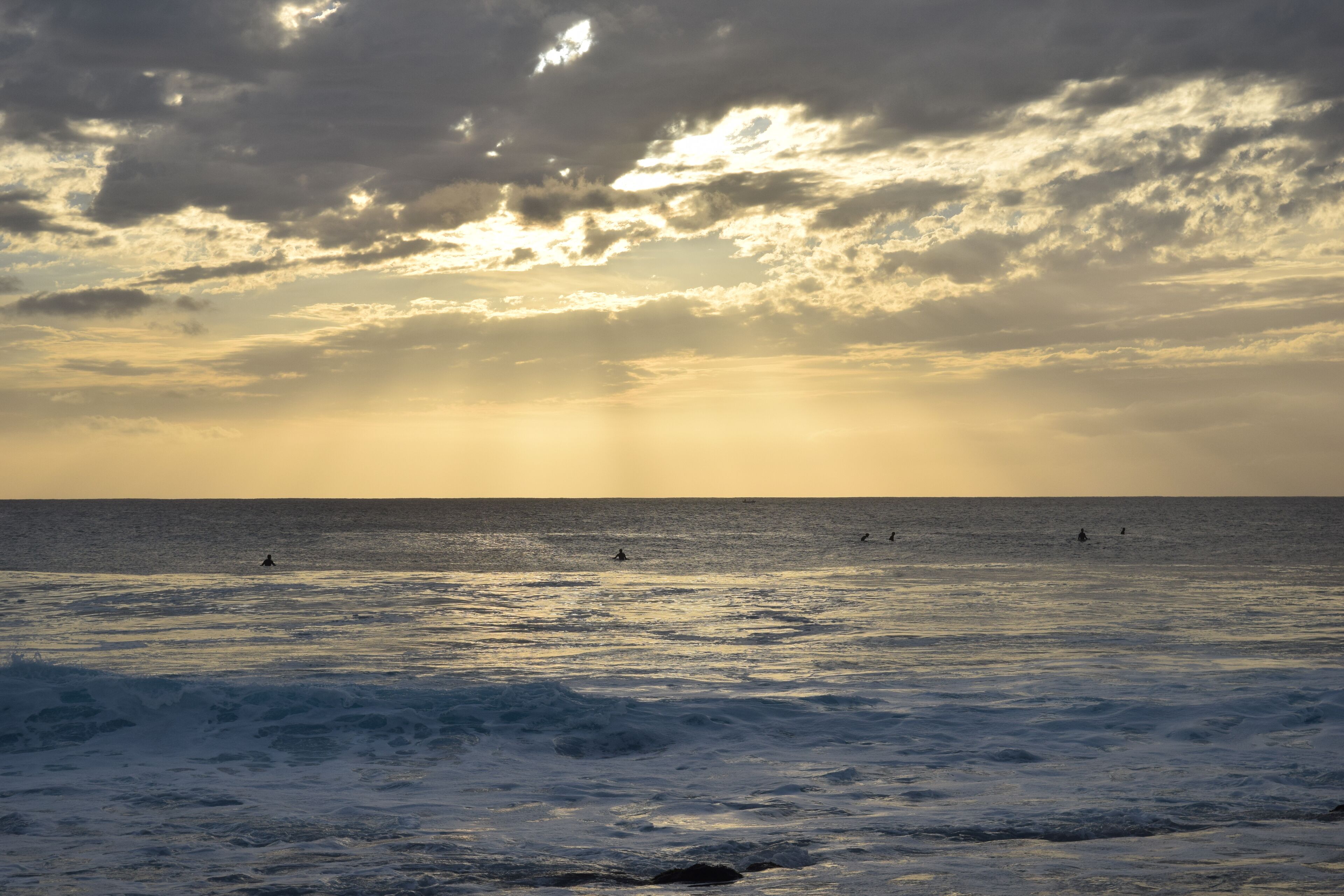 Surfers waiting for the perfect wave.
