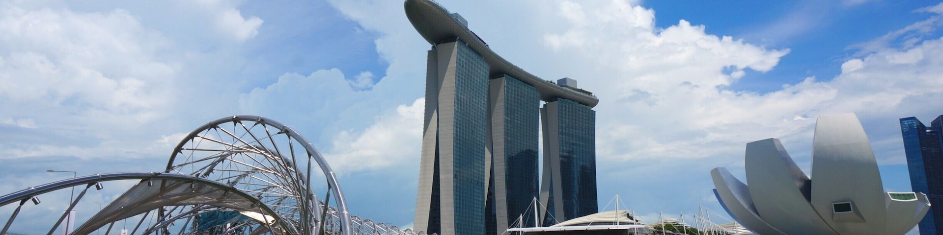Exploring Marina Bay. From the left, Helix Bridge, Marina Bay Sands Hotel, and the building that looks like a flower is the Arts & Science Museum.