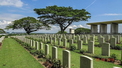 This is well worth the visit and is so well maintained. Kranji War Cemetery is 22 kilometres north of the city of Singapore, on the north side of Singapore Island overlooking the Straits of Johore. It is located just to the West of the Singapore-Johore road (Bukit Timah Expressway) on Woodlands Road, just to the south of the crossroads with Turf Club Avenue and Kranji Road. There is a short approach road from the main road. The Cemetery is known locally as Kranji Memorial and one must be sure of the address before boarding a taxi as most taxi drivers do not know the Cemetery. There are also bus stops on the main road facing the Cemetery. The Kranji MRT (train) terminal is a short distance from the Cemetery, approximately 10 to 15 minutes away by foot. A previous visitor has advised us that a small map of the route can be obtained from the MRT ticket office.