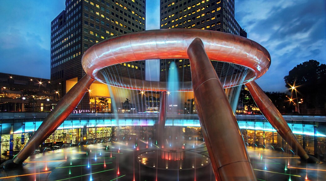 財富之泉 l The Fountain of Wealth *Corners of Singapore*
#Trovember Photo Contest
#Suntec City
#Singapore
#City
#Cityscape
#Landscape
#Night
#Cloud
#Cloudscape
#Sky
The Fountain of Wealth is listed by the Guinness Book of Records in 1998 as the largest fountain in the world. It is located in one of Singapore's largest shopping malls, Suntec City. During certain periods of the day, the fountain is turned off and visitors are invited to walk around a mini fountain at the center of the fountain's base to collect coins for good luck. At night, the fountain is the setting for laser performances, as well as live song and laser message dedications between 8pm to 9pm daily. It is situated in such a way the fountain is the hub of the shopping mall.
This photo is inside my Top 30 "Corners of Singapore" collection album, enjoy all^^
Our Home by Kit Chan ~ Enjoy!
https://www.youtube.com/watch?v=O7g-PUjbusQ";
Photo Licensed by iLOVEnature's Photography Inspiration l All rights reserved.
