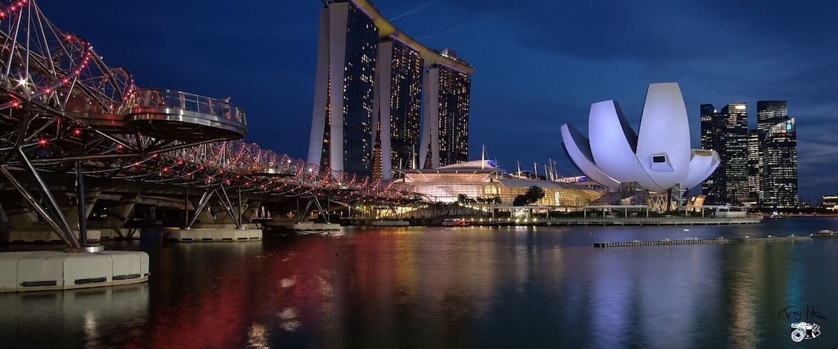 Taken from the walking path at the base of the Helix Bridge. You can get a great view of the bridge, Marina Bay sands and the artscience building as well as a bit of downtown.