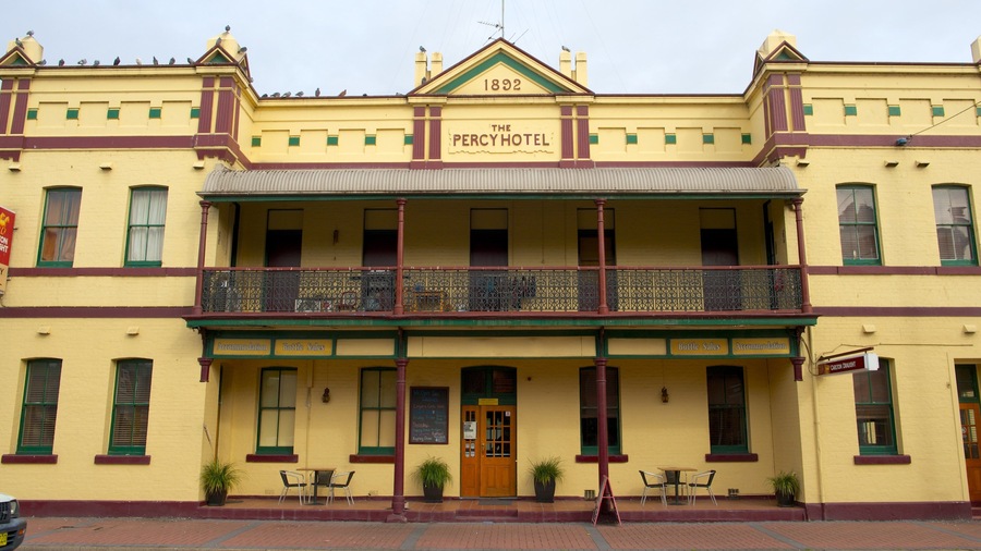 Singleton featuring signage, a hotel and heritage architecture