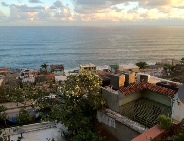 View of the ocean & the colorful La Perla slum in Old San Juan.  The irony that such a lovely oceanfront location is home to crime and poverty boggles my mind.