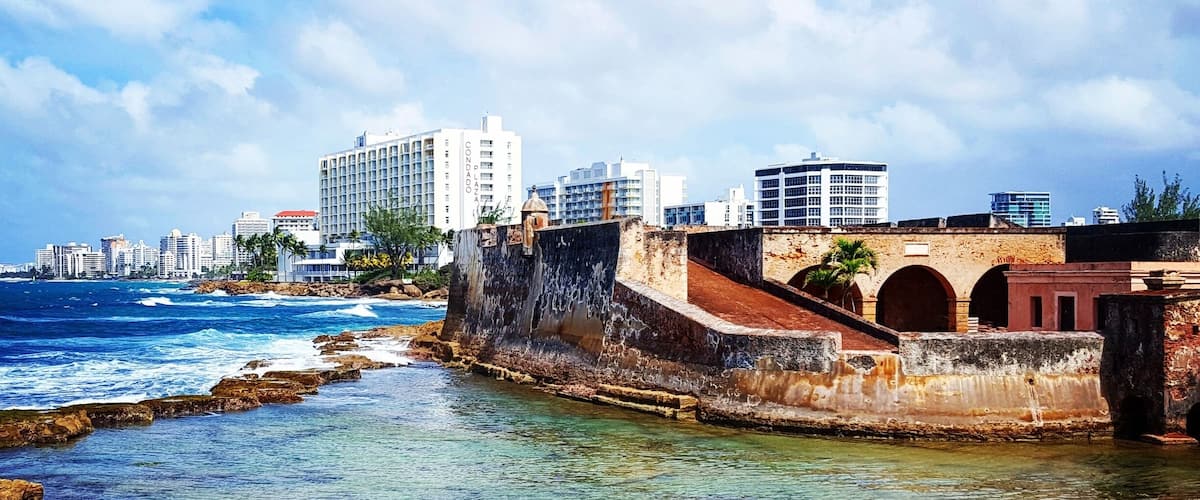 The Caribe Hilton is one of my all time favorite hotels - and not just because of this old-meets-new view!
