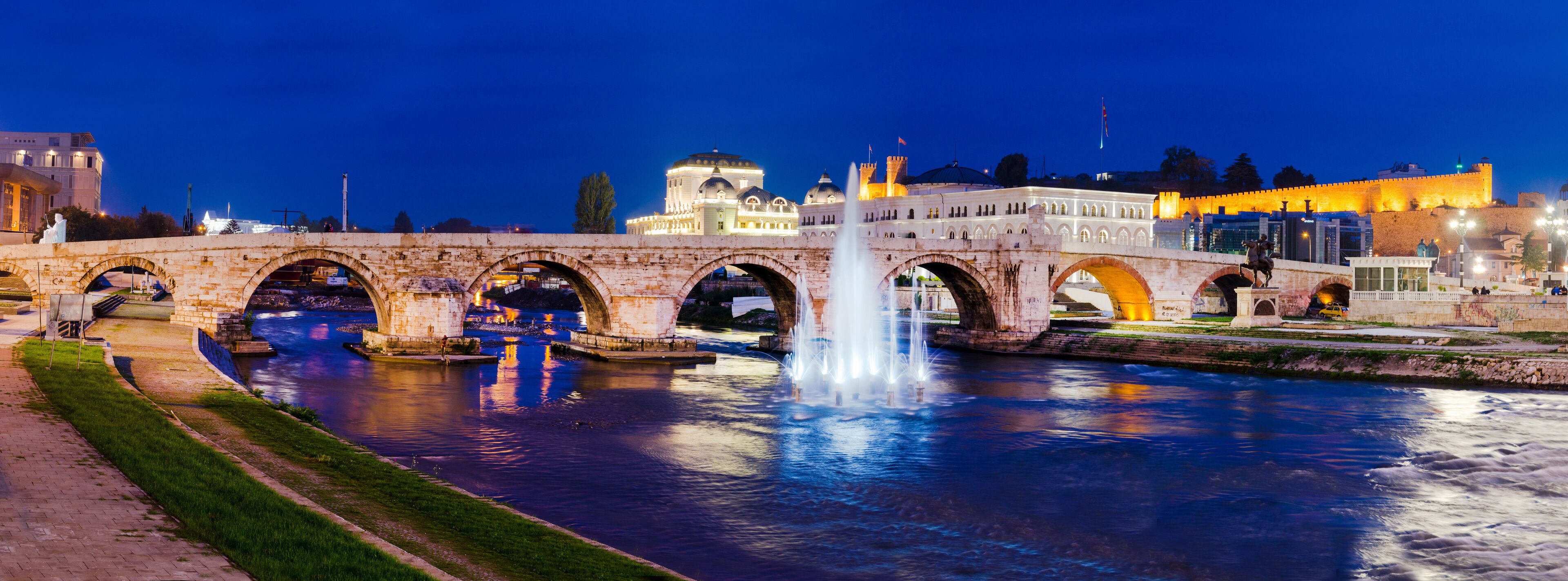 Panoramic view on Stone bridge from Oko bridge in Skopje in the evening