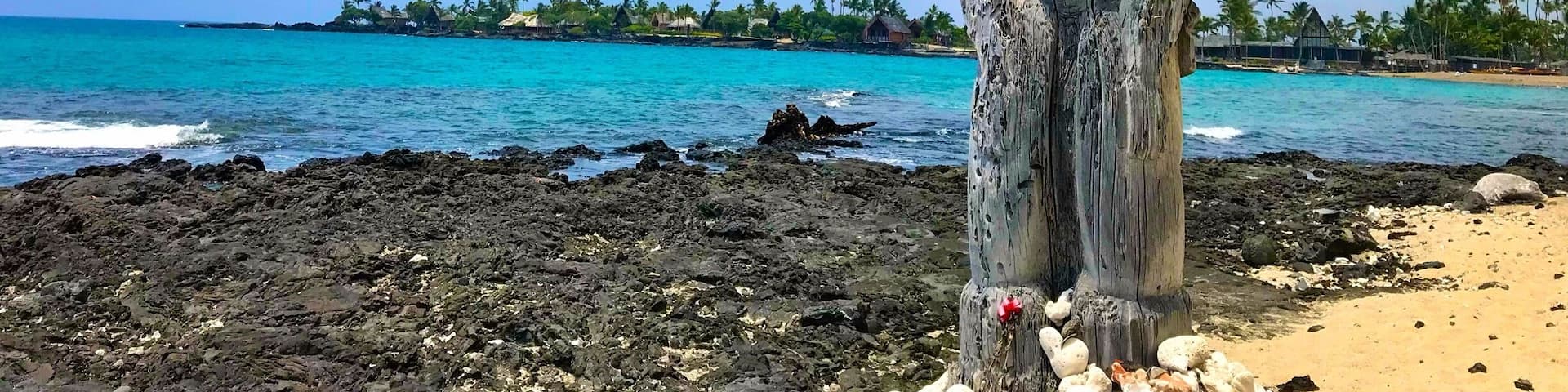 A weathered statue of the Hawaii god Ku.
Ku is the god of war and prosperity.