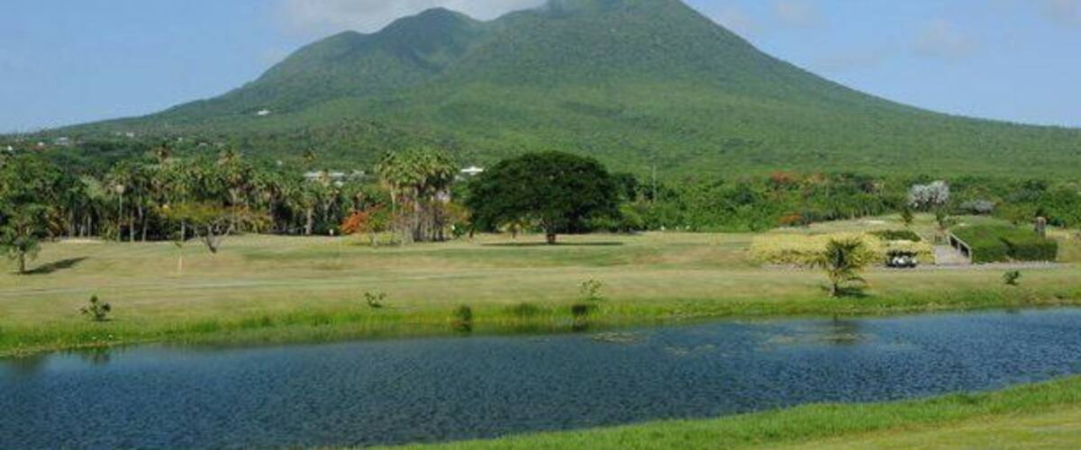 Nevis is the quintessential volcanic island paradise with its conical shaped peak that is normally obscured by cloud cover.
This was actually the view from our room and we had a rare clear day and the top was visible for a few hours.
The volcano was actually named by Christopher Columbus when he discovered the island in 1493. Thinking the white stuff on top of the volcano was snow he called it Nuestra Señora de Nieves. Nieve means snow in Spanish... it later morphed from Nieves to Nevis.
A very quite sleepy island that is great if you want to escape it all big time. It is truly one of the nicest islands in the Caribbean.