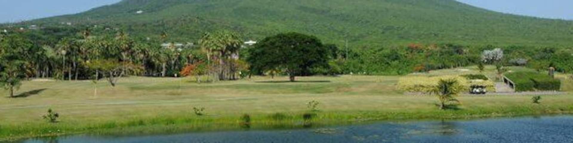 Nevis is the quintessential volcanic island paradise with its conical shaped peak that is normally obscured by cloud cover.
This was actually the view from our room and we had a rare clear day and the top was visible for a few hours.
The volcano was actually named by Christopher Columbus when he discovered the island in 1493. Thinking the white stuff on top of the volcano was snow he called it Nuestra Señora de Nieves. Nieve means snow in Spanish... it later morphed from Nieves to Nevis.
A very quite sleepy island that is great if you want to escape it all big time. It is truly one of the nicest islands in the Caribbean.