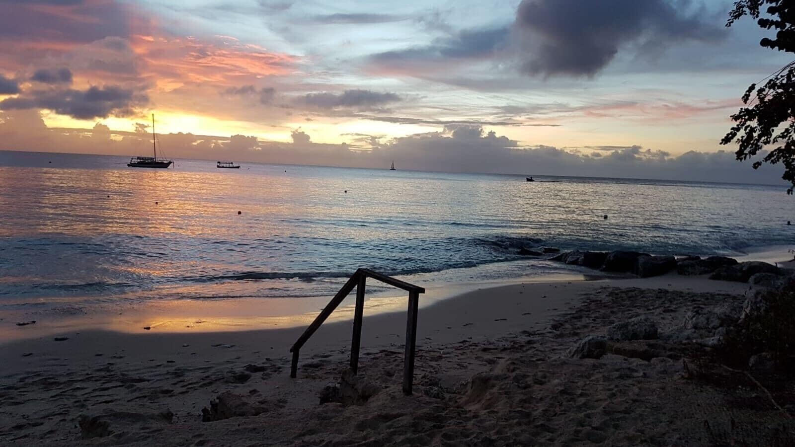 Enjoy a cocktail or two as you watch the sunset on Barbados' stunning white sand beaches of the Platinum Coast #LifeAtExpedia #BeachTips