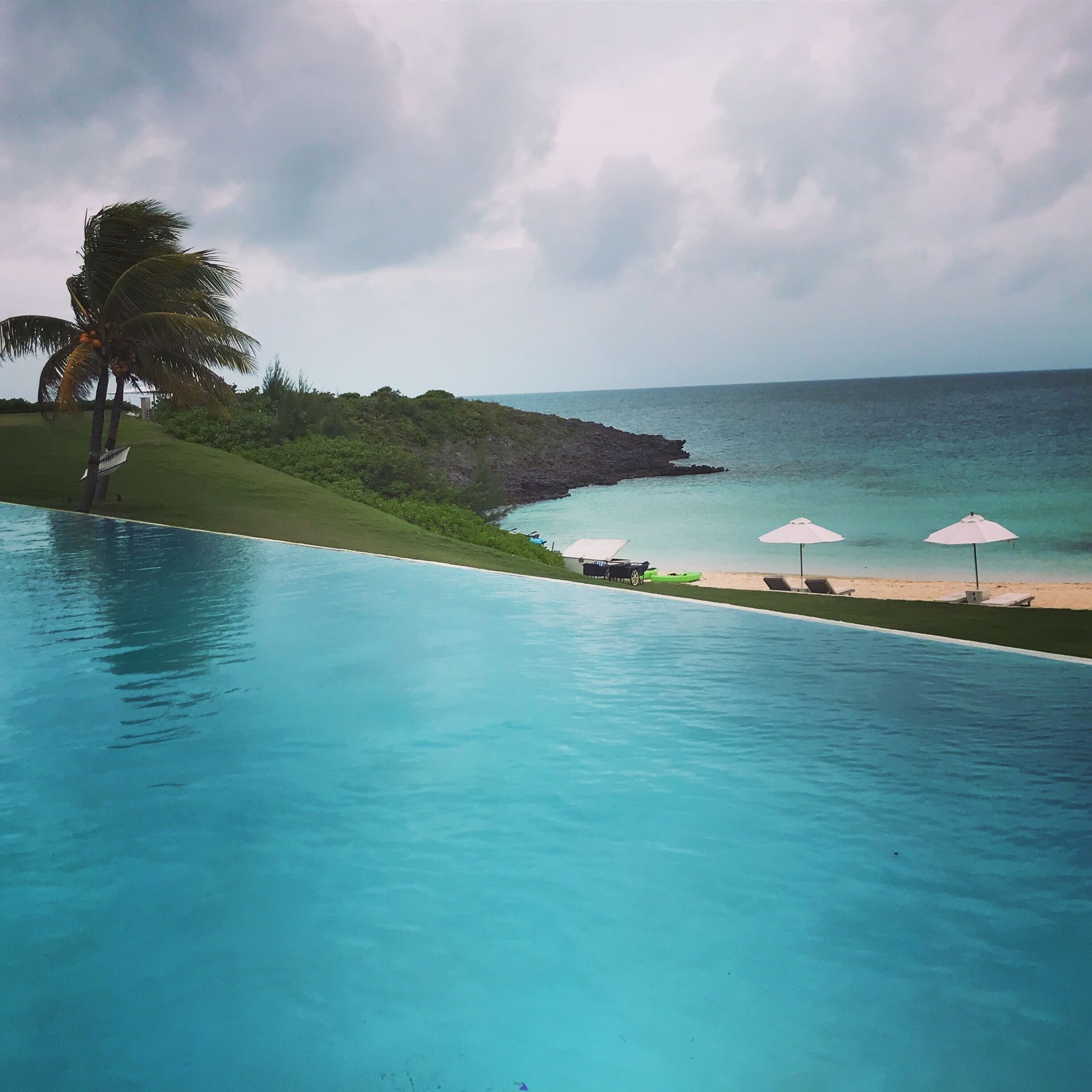 Shades of blue from the infinity pool to the ocean beyond at this boutique property!  #lifeatexpedia 