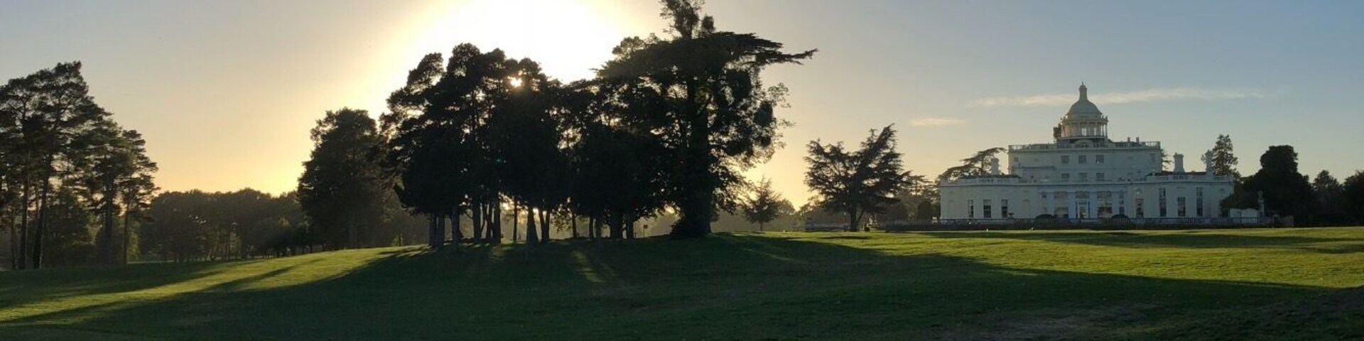 Sun setting over 18th at Stoke Park