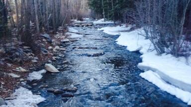 This was on a hiking trail off of the slopes and by a bridge. It was slippery to get to but beautiful.