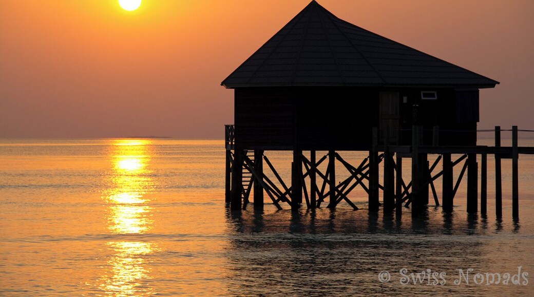 Sunrise over the Komandoo Island Resort.
That's the tiny little island we lived and worked for two years.
If you like to know more about diving in the Maldives, just read our article:
http://www.swissnomads.com/2014/09/best-dive-sites-lhaviyani-atoll-maldives/