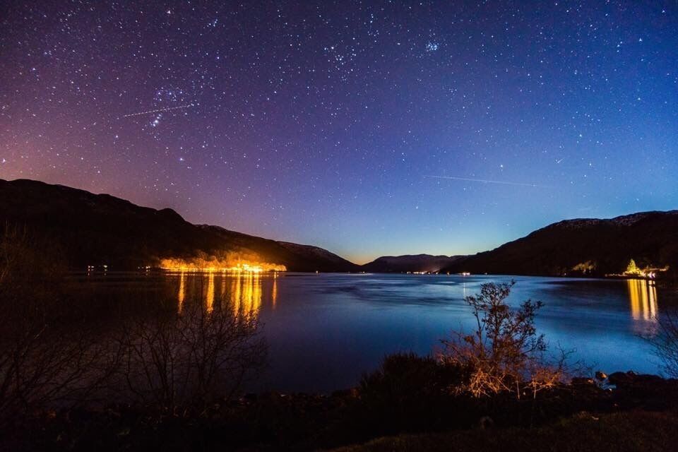 Clear night sky looking across Loch Earn from St. Fillans 