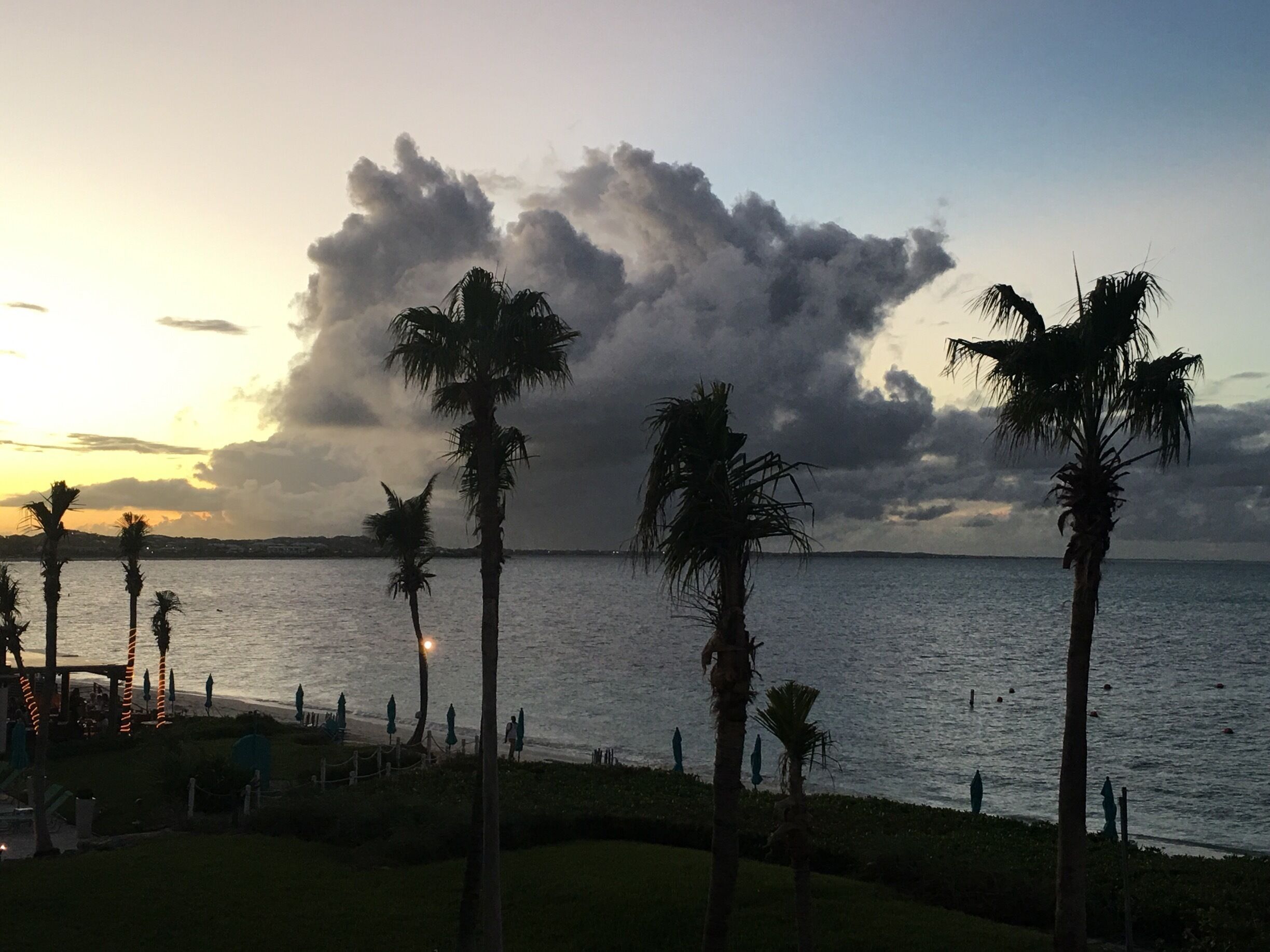 Cool cloud formations.  You can also see how beat up the palms trees are after Hurricane Maria came through Turks & Caicos.