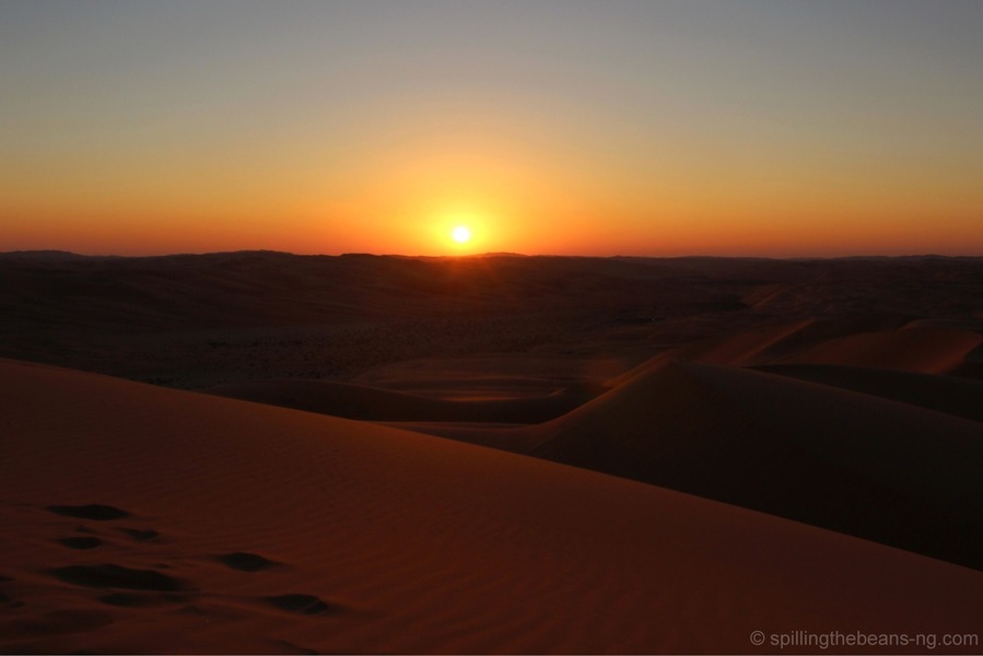 A special sunset in the Liwa Desert, on the northern edge of Rub Al’ Khali (The Empty Quarter), the world’s largest uninterrupted sand desert. 
I climbed a high sand dune and was treated to an extraordinary sight. Seated on the cushion that was the soft fine sand, I looked out at the iridescent sand dunes that stretched out far and wide, and watched in awe as the bright beautiful sun finally disappeared into the horizon.
http://www.spillingthebeans-ng.com/explore-the-elements
#troveon #abudhabi #uae #goldenhour #hiking #bestof5