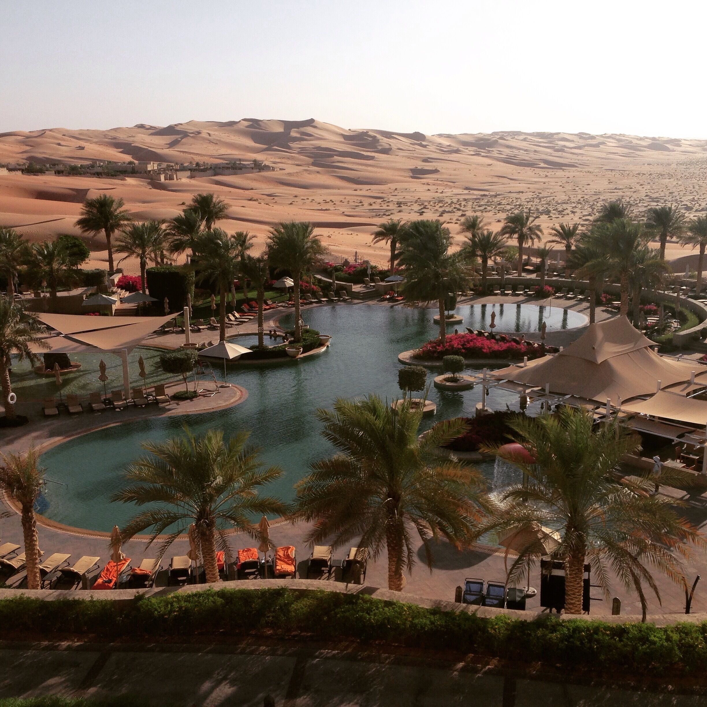 Words cannot express the surreal tranquility of the Empty Quarter. Perhaps the most luxurious way to experience this massive expanse of sand in the UAE is from poolside at the Qasr Al Sarab. #emptyquarter #pool #roadtrip #uae