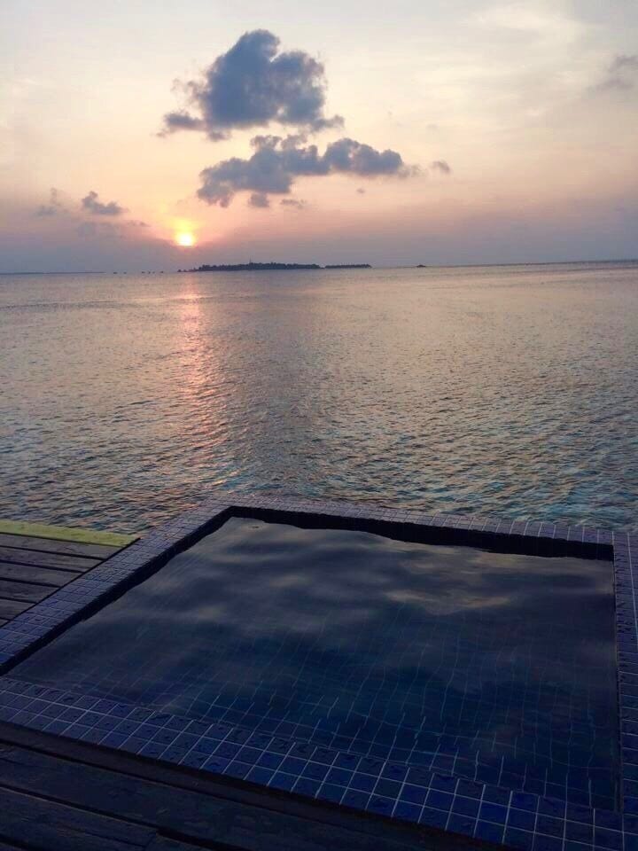 Enjoying sunset from out water villa 