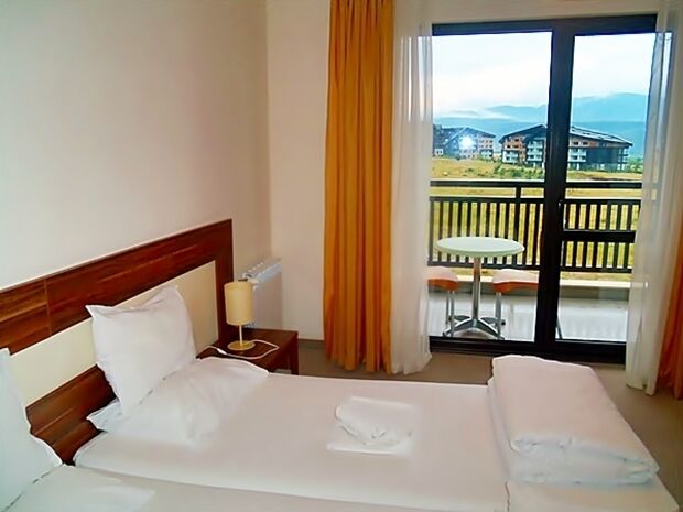 The hotel is located in the area of Razlog, only a 10 minutes ride from the city of Bansko. The Balkan Jewel resort is amphitheatrically built around the spacious pool area, including a garden and a playground. Besides rooms, small apartments are also available, all well-furnished. 
www.balkanjewel.com
