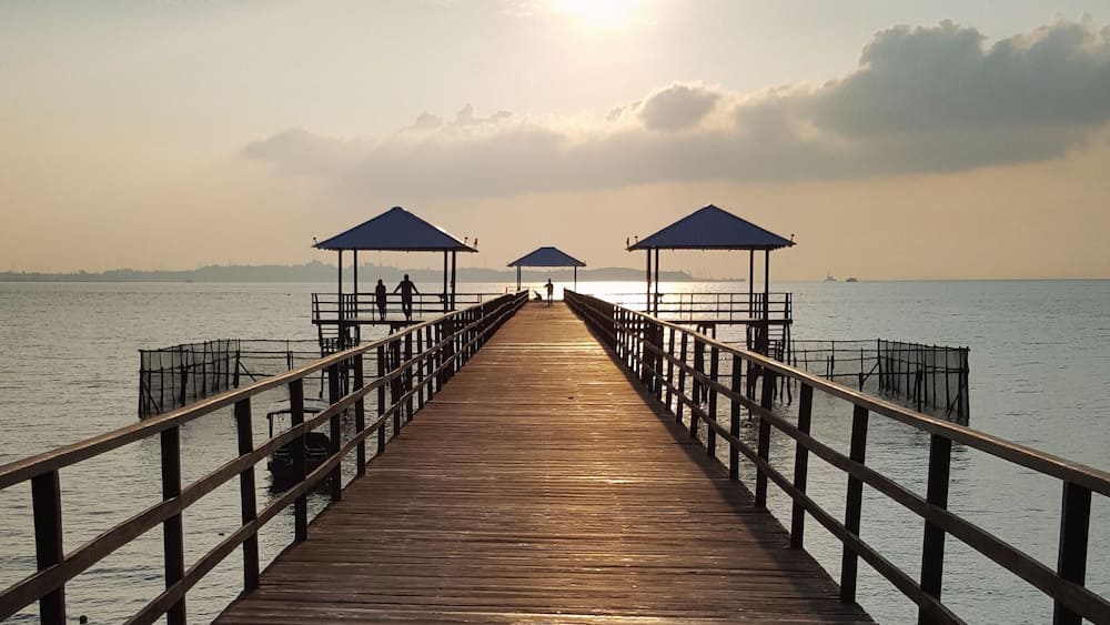 Symmetrical jetty leads out from the resort.