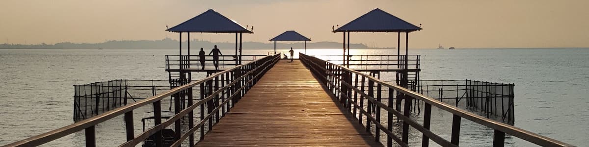 Symmetrical jetty leads out from the resort.
