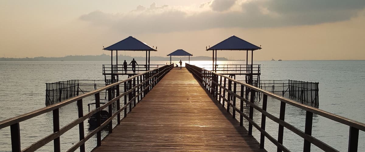 Symmetrical jetty leads out from the resort.