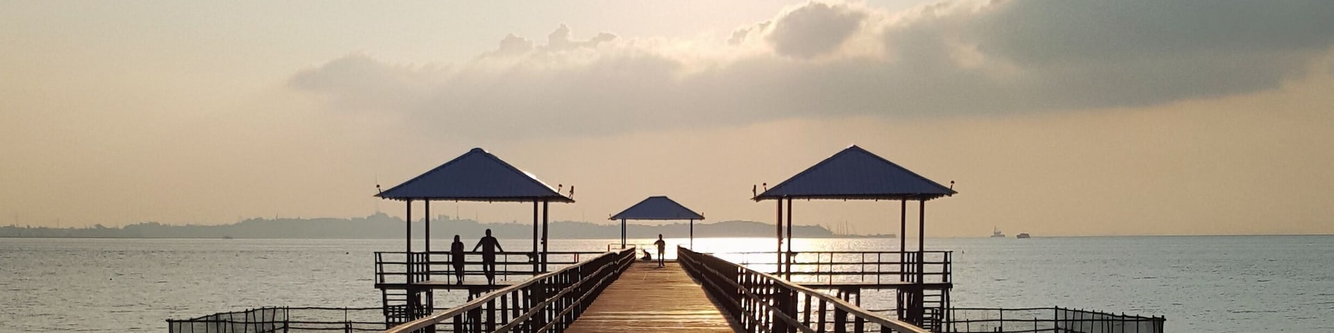 Symmetrical jetty leads out from the resort.