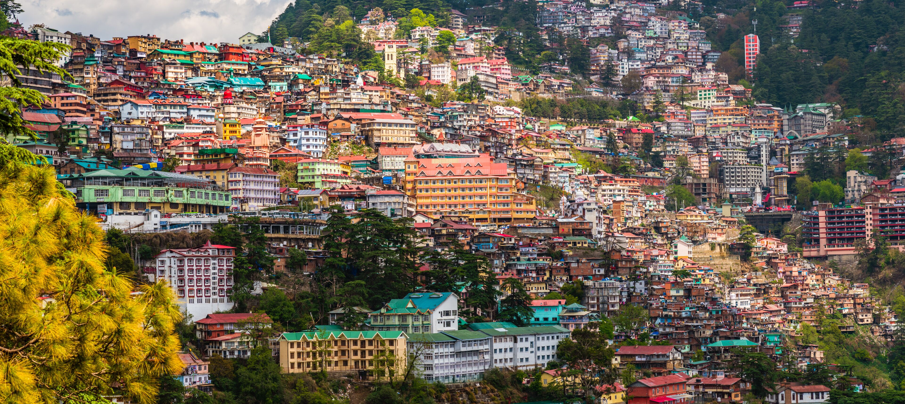 Beautiful panoramic cityscape of Shimla, the state capital of Himachal Pradesh located amidst Himalayas of India.