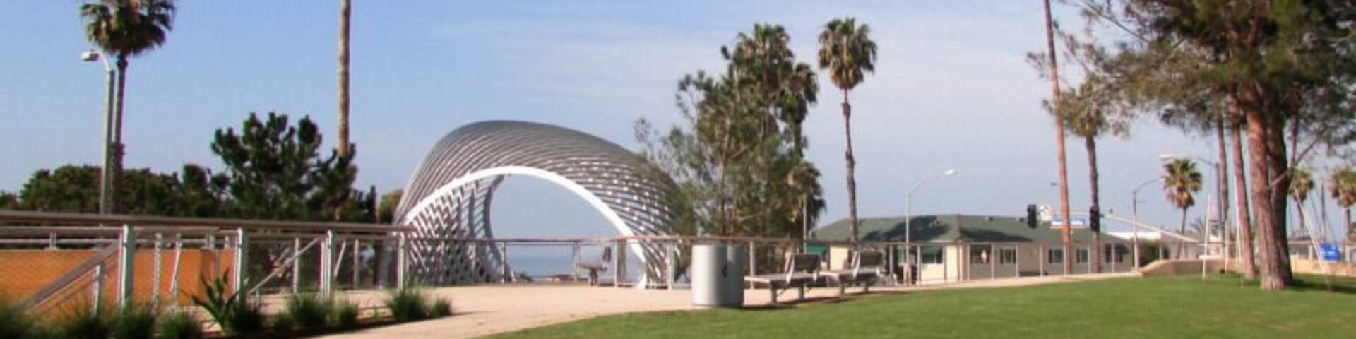 Tongva Park is a newly built park in Downtown Santa Monica, close to the beach, the Santa Monica Pier, 3rd Street Promenade and Santa Monica Place. Named for the Tongva people who have lived in the Los Angeles area for thousands of years, the park provides lawns and walkways, picnic tables, fountains, playgounds and futuristic lookouts.
http://bigcitiesbrightlights.wordpress.com/2014/07/21/santa-monica-the-tongva-park/