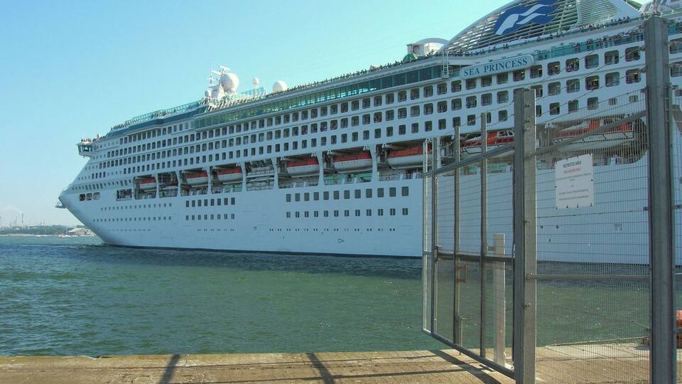 The cruise ship Sea Princess leaving Southampton harbour ; fences are visible on the right, which have prevented access to the ship under the ISPS code.