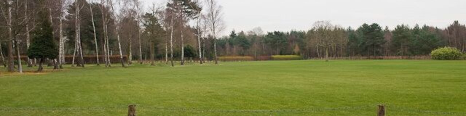 Garden adjacent to Clump Inn Football Ground, Chilworth Park-like garden apparently attached to a private house. There is a path in the foreground running between parallel fences, not shown on Magic.