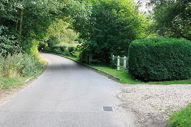 Sandy Lane crossing a stream, nr Waltham Chase. The stream was almost dry. The lane is single track.