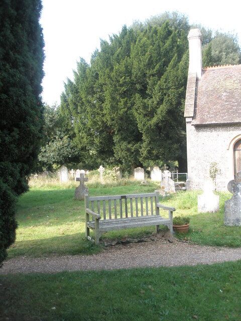 Seat in the churchyard at St Barnabas, Swanmore