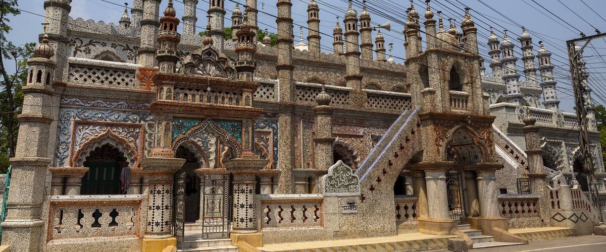 A historic temple with intricate carvings and multiple spires.