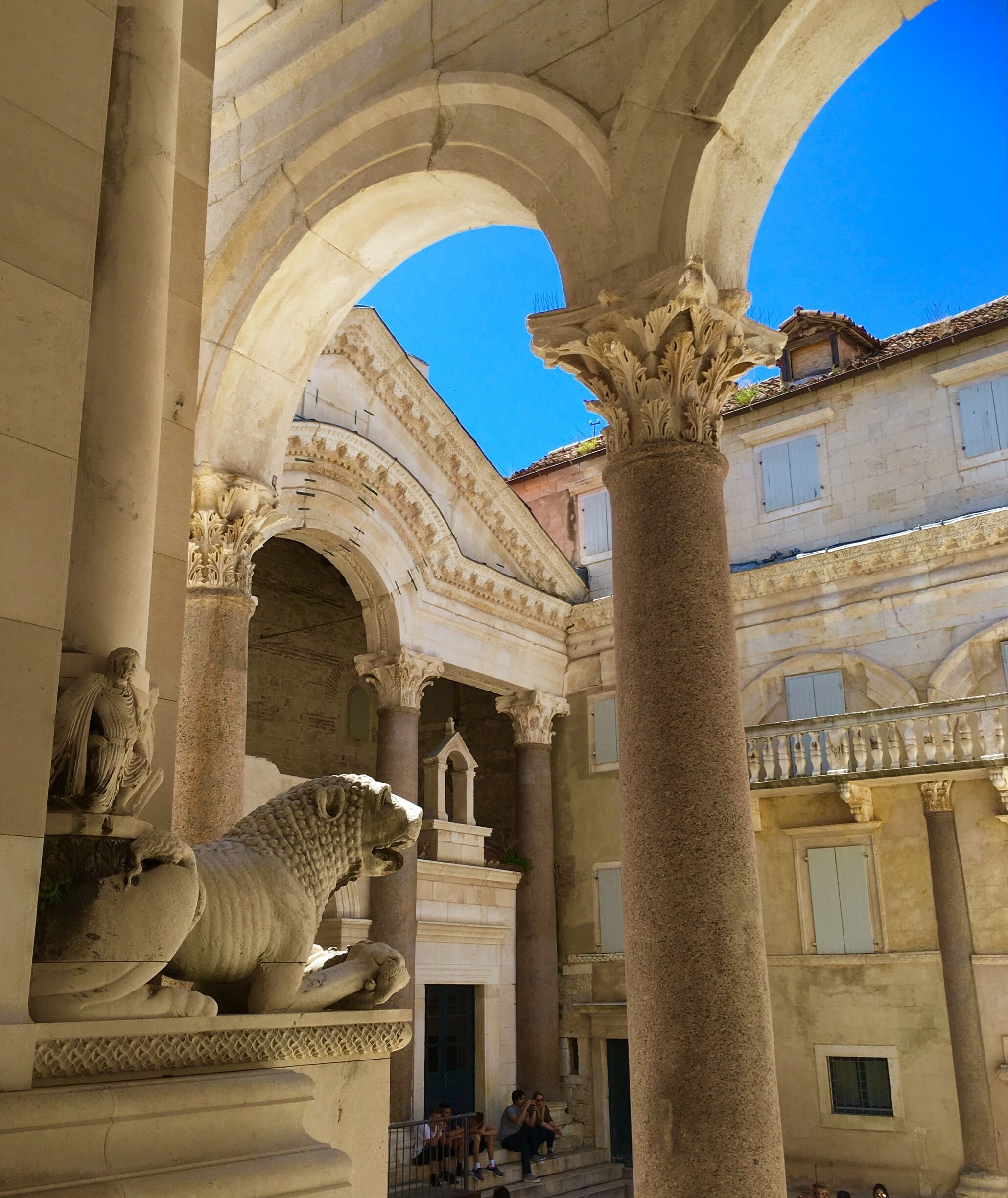 At the Peristyle, the central square of the Roman Diocletian's Palace in Split, where the emperor appeared and several temples were located. 
