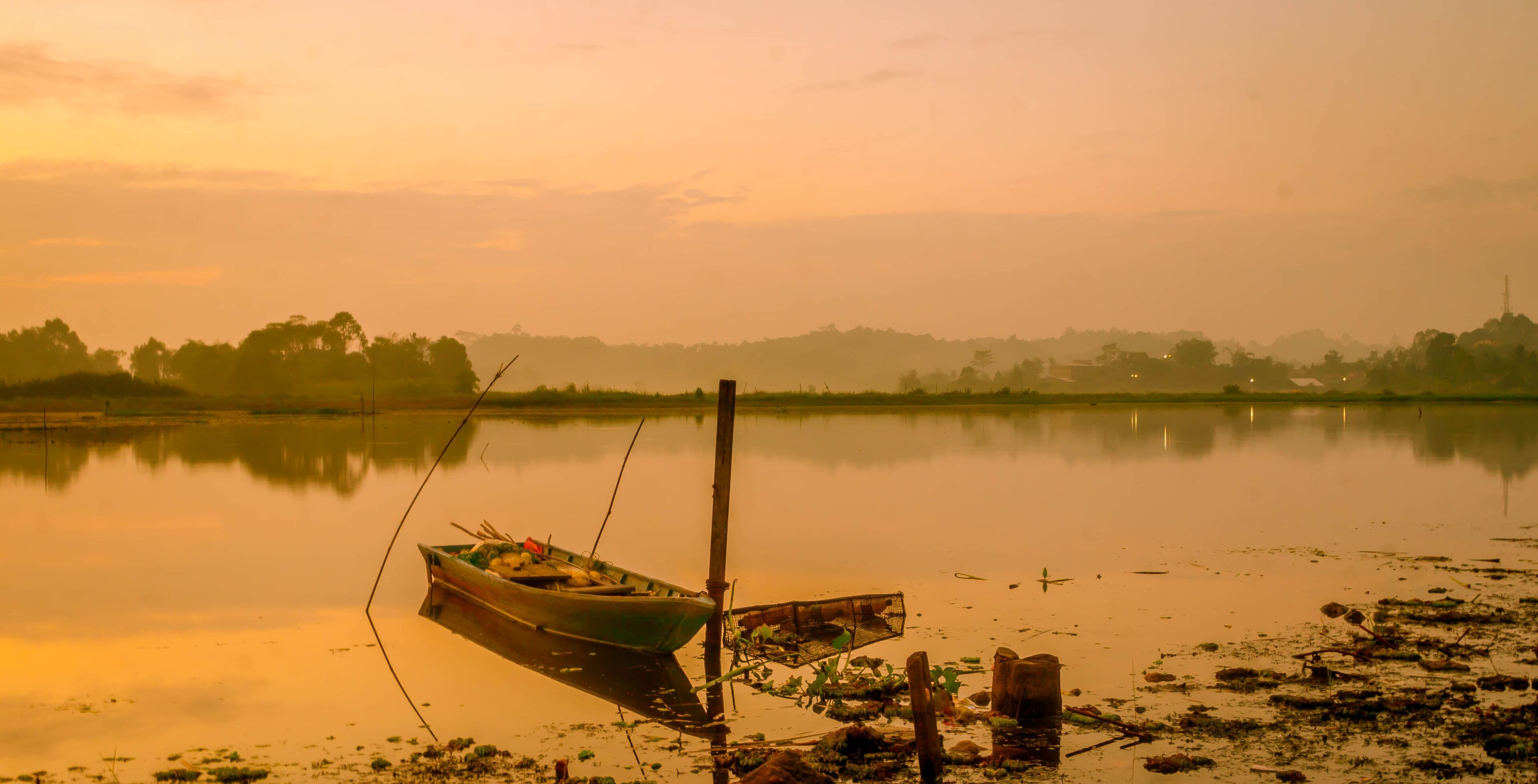 beautiful panorama of sunrise at Benanga Reservoir, Samarinda, East Kalimantan, Indonesia