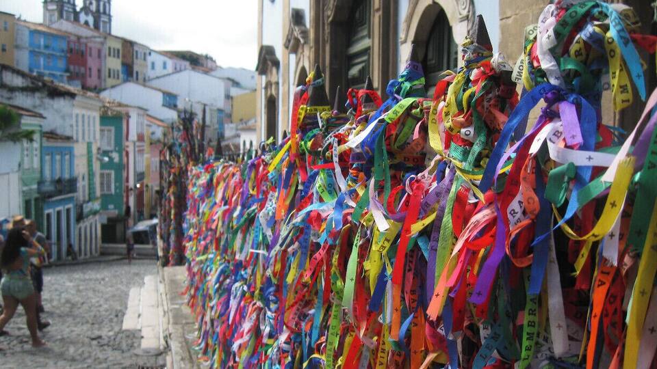 Colorful fitas, or wish ribbons, tied to the gate outside Igreja Nossa Senhora do Rosario dos Pretos. #colorful