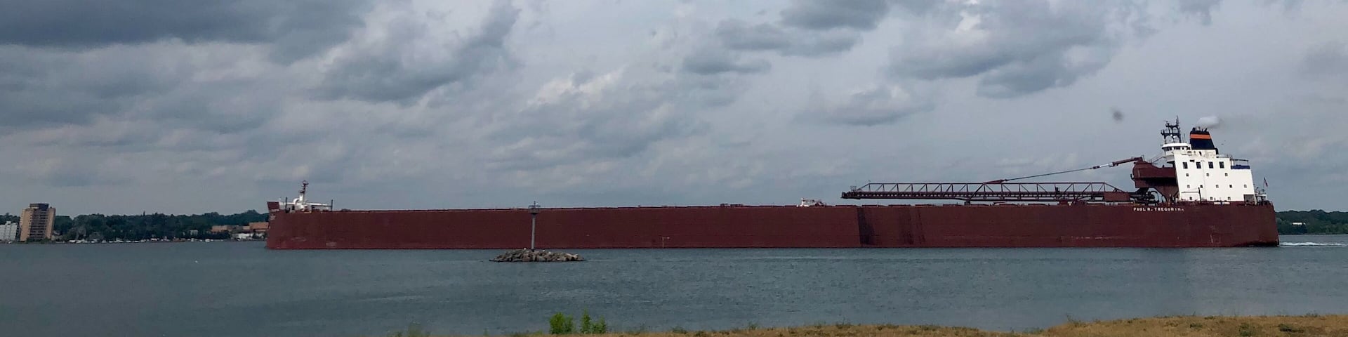 MV Paul R. Tregurtha is a Great Lakes-based bulk carrier freighter. She is the current Queen of the Lakes, an unofficial but widely recognized title given to the longest vessel active on the Great Lakes.
Length: 1,013′
Capacity: Iron ore: 68,000 long tons; Coal: 63,616 long tons