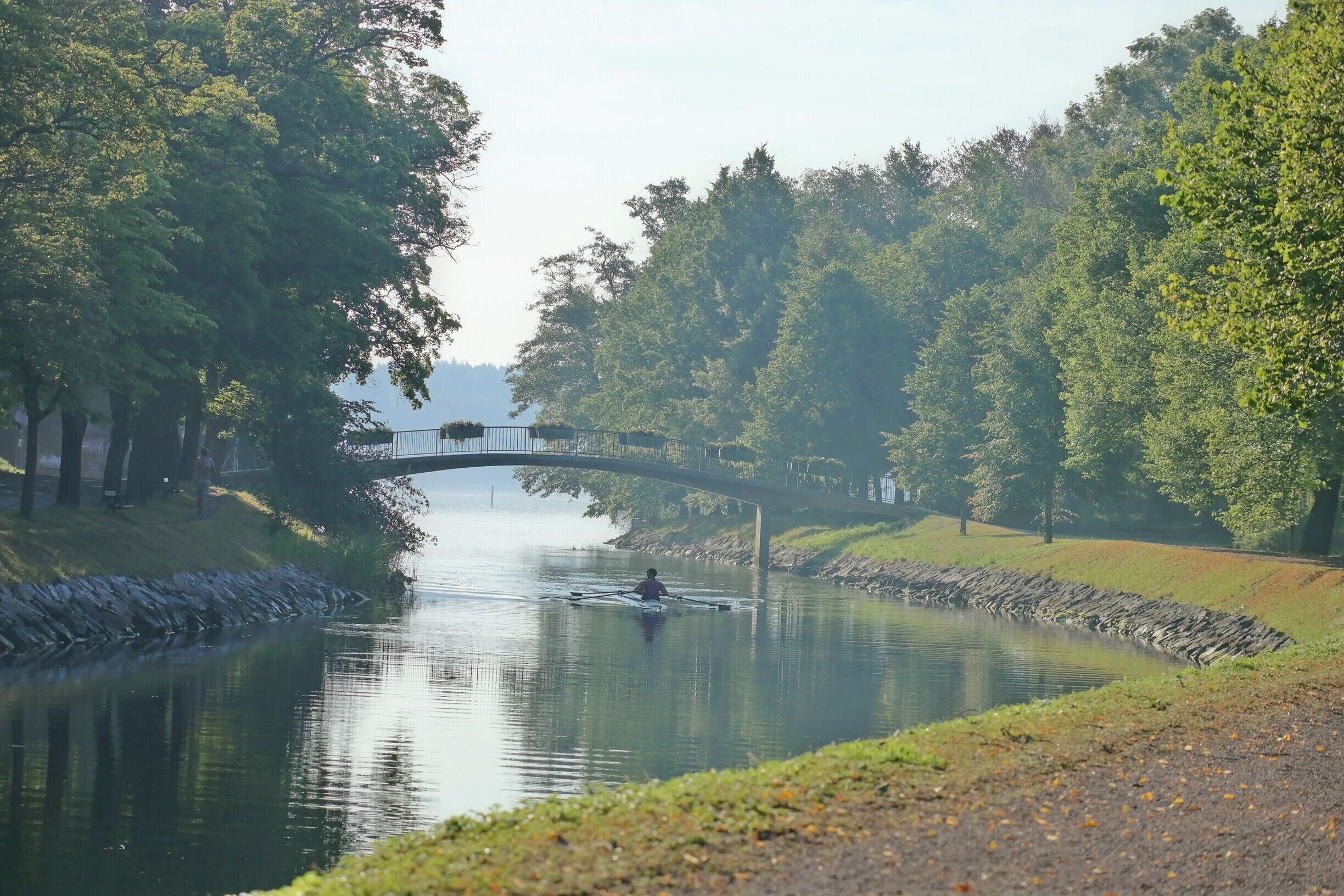 29 July 19:32

Djurgårdsbrunnskanalen (Swedish: "The Djurgården Well Canal") is a canal in central Stockholm, Sweden, separating the island Djurgården from the northern mainland (or more correctly Southern and Northern Djurgården).

The decision to build the canal was made by King Charles XIV in 1825. The canal was completed in 1834. It was built to make it easier for smaller ships with supplies to reach the center of Stockholm, but also for aesthetic reasons because Djurgården is a royal park.

- Wikipedia 