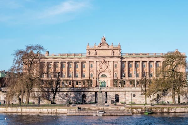 The Parliament House (Swedish: Riksdagshuset), is the seat of the parliament of Sweden, the Riksdag. It is located on nearly half of Helgeandsholmen (island), in the Gamla stan (old town) district of central Stockholm
The building complex was designed by Aron Johansson in the Neoclassical style, with a centered Baroque Revival style facade section. Parliament House was constructed between 1897 and 1905.
- Wikipedia