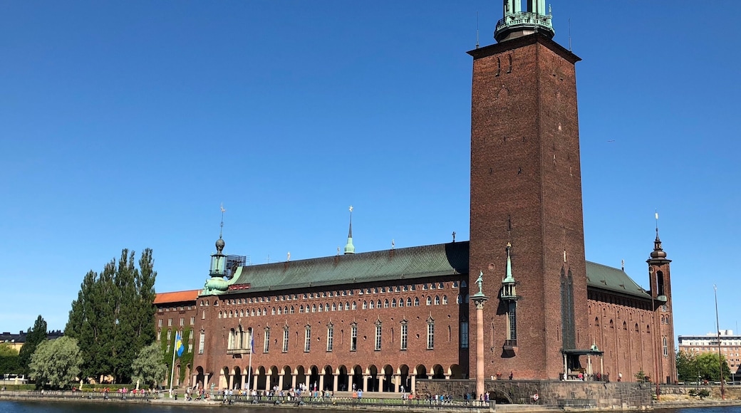 The City Hall is one of Stockholm's most iconic buildings and stars in countless images and postcards of the city. Dating from 1923, the hall opened on that most Swedish of dates Midsummer's Eve. Housed within are assembly rooms, offices, works of art, and the machinery of civil democracy. The prestigious annual Nobel Banquets are held here. Recipients dine first in Blå hallen and then move on to the formal ball in Gyllene salen, which has no less than 18 million mosaics adorning its walls. A particular treat is the chance to view the city from the famous tower.