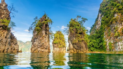 Beautiful mountains lake river sky and natural attractions in Ratchaprapha Dam at Khao Sok National Park, Surat Thani Province, Thailand.; Shutterstock ID 244029868