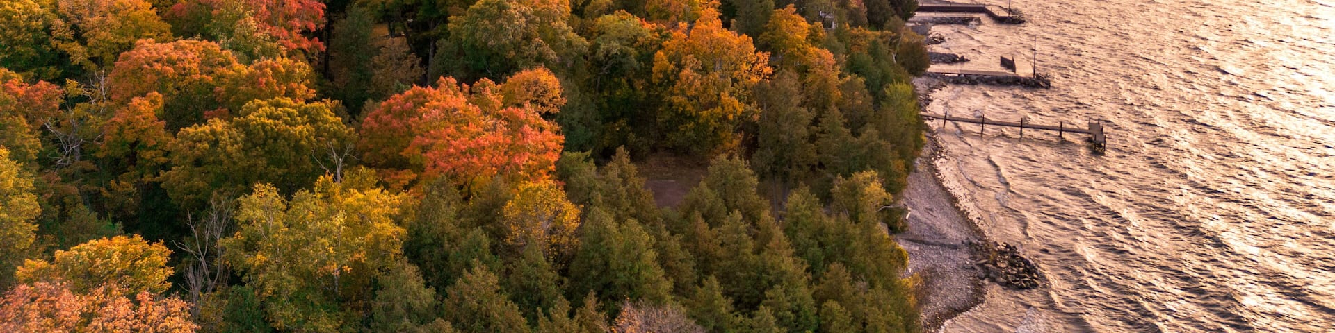 Autumn Cliffs Along Lake Michigan, Door County – Aerial View of Vibrant Fall Foliage