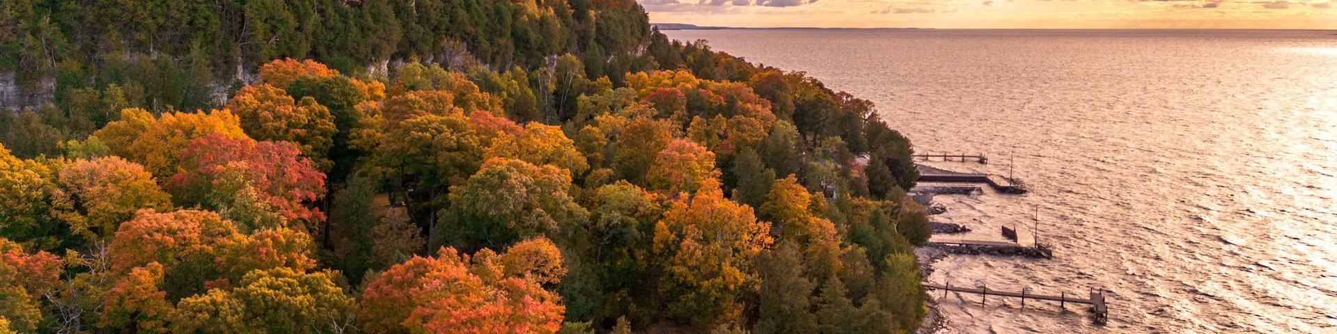 Autumn Cliffs Along Lake Michigan, Door County – Aerial View of Vibrant Fall Foliage