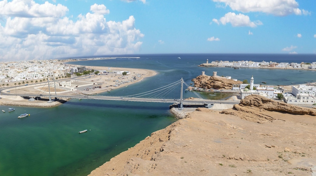 Sur, Oman - an important point for sailors and famous also for its building wooden ships, Sur is a pearl of Oman, with its fusion of green waters, white buildings and red rocks