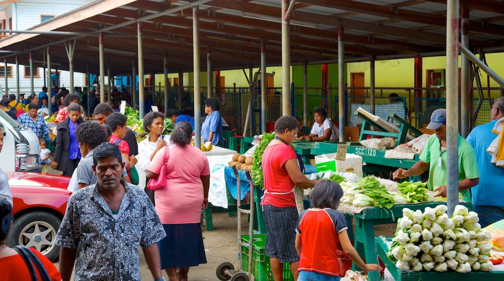 Suva which includes markets and street scenes as well as a large group of people
